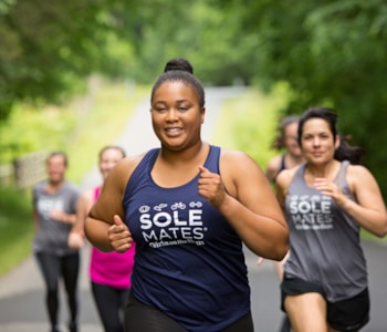 Group of SoleMates participants running 